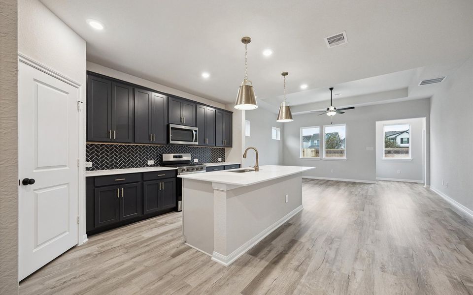 Furnished interior view inside a new home in Elyson, Katy (Image 5).