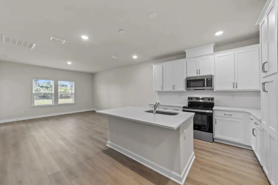 Sample Living Area photo. Actual structural options and design finishes of home may vary.
