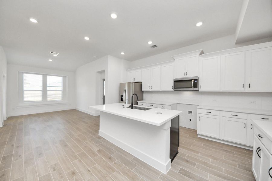 Furnished interior view inside a new home in Sunterra: Landmark Collection, Katy (Image 5).