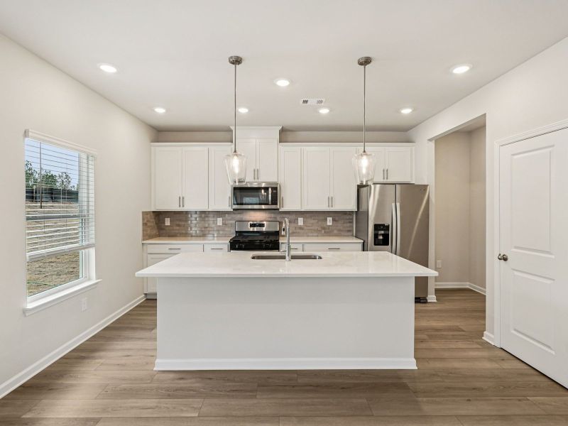 Furnished interior view inside a new home in Harmony Manor, Fairburn (Image 5).