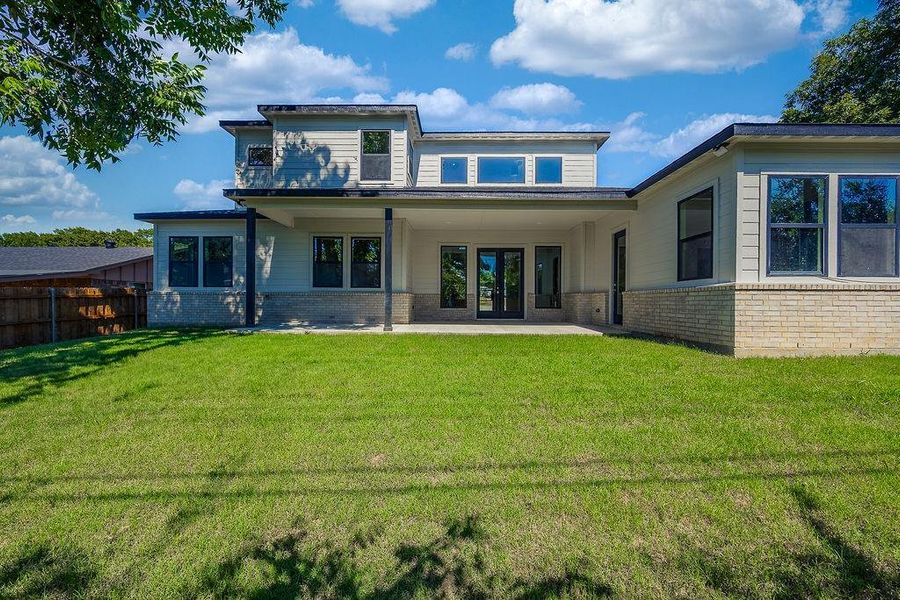 Front exterior of a new home in , Arlington, TX, highlighting curb appeal (Image 2). Front exterior of a new home in , Arlington, TX, highlighting curb appeal (Image 2).