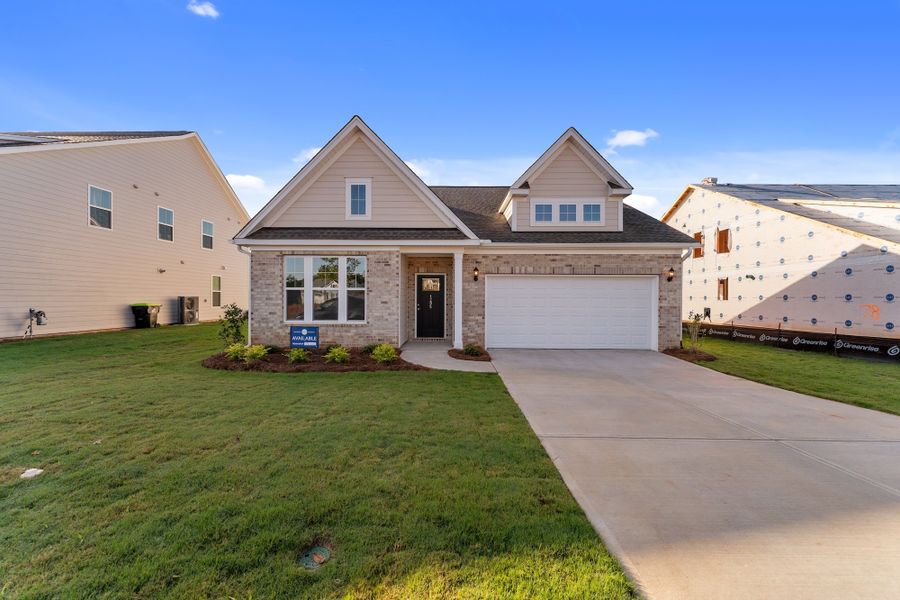 Front exterior of a new home in Cottages at Lake Emory, Inman, SC, highlighting curb appeal (Image 1). Front exterior of a new home in Cottages at Lake Emory, Inman, SC, highlighting curb appeal (Image 1).