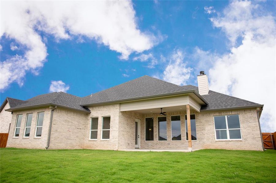 Exterior details and patio area of a home in , Hewitt (Image 22).