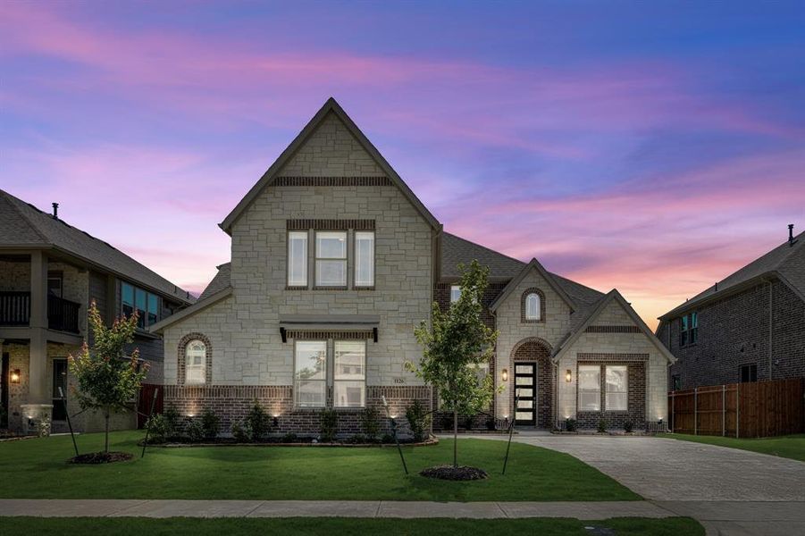 Front exterior of a new home in Mockingbird Heights Classic 60, Midlothian, TX, highlighting curb appeal (Image 2). Front exterior of a new home in Mockingbird Heights Classic 60, Midlothian, TX, highlighting curb appeal (Image 2).