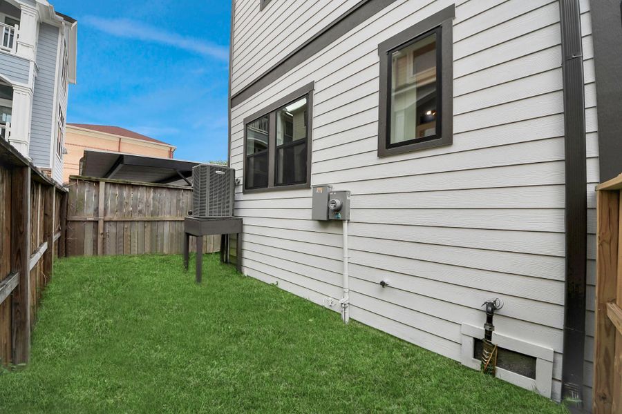 Exterior details and patio area of a home in , Houston (Image 29).