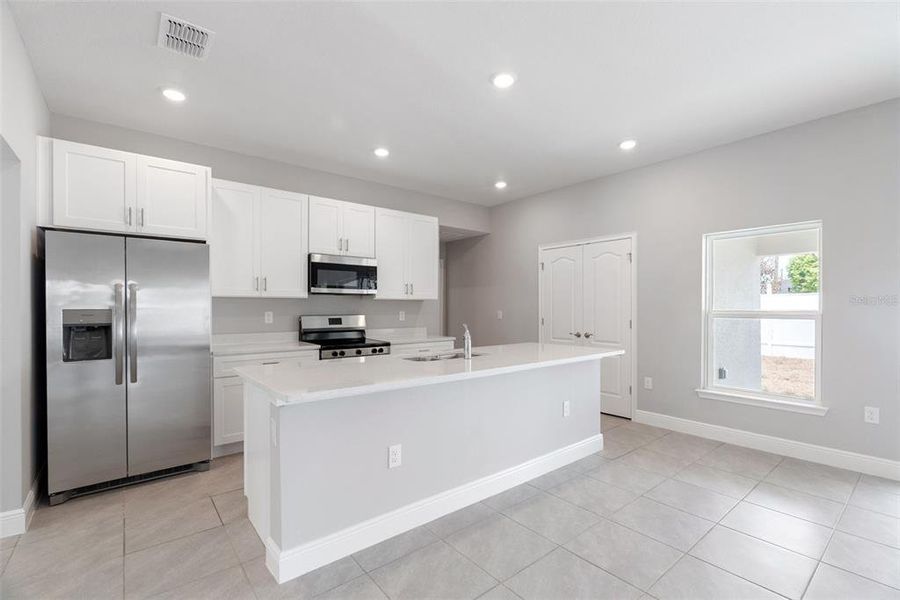 Furnished interior view inside a new home in , Kissimmee (Image 5).