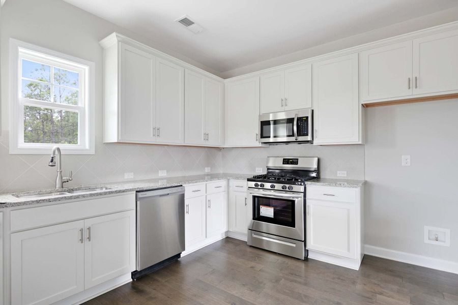 Representative furnished interior of a home built from the Meadowbrook by Caviness & Cates Communities in Sutherland Station at Olde Liberty, Franklinton (Image 151). Representative furnished interior of a home built from the Meadowbrook by Caviness & Cates Communities in Sutherland Station at Olde Liberty, Franklinton (Image 151).