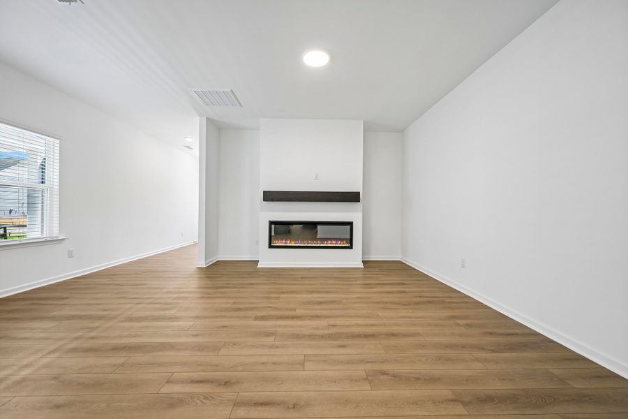 Representative unfurnished interior of a home built from the Emma II by Ashton Woods in The Point, Rolesville (Image 13).