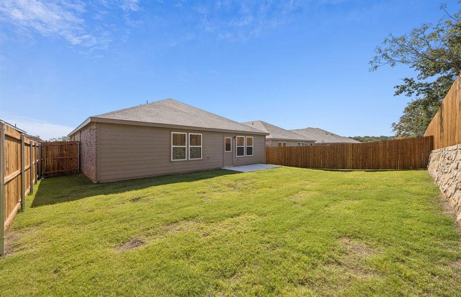 Spacious, fenced-in backyard Spacious, fenced-in backyard