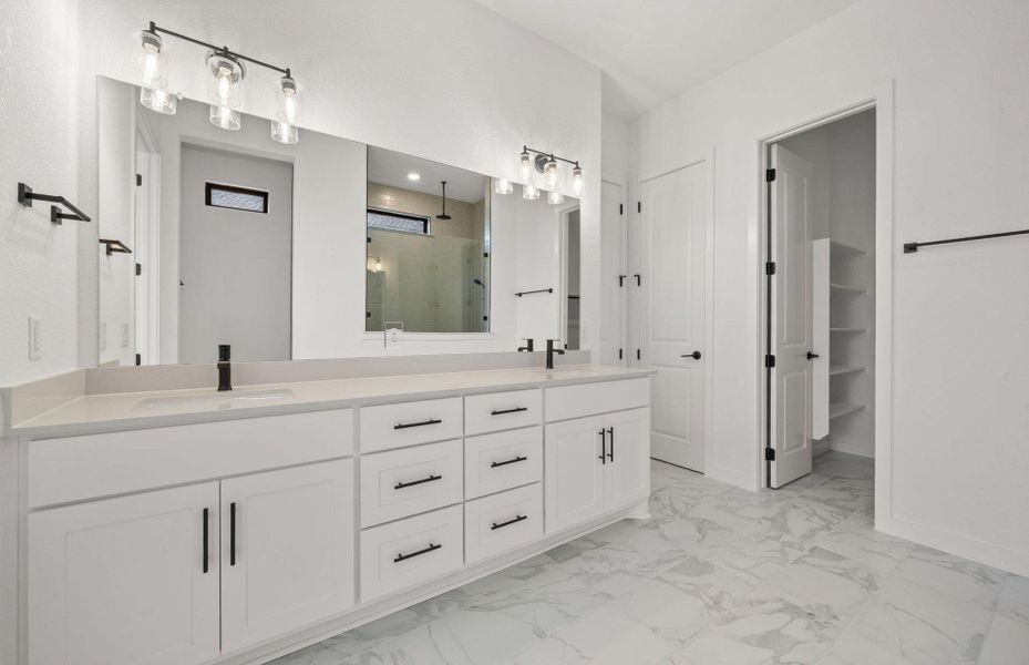 Furnished interior view inside a new home in 6 Creeks, Kyle (Image 6).