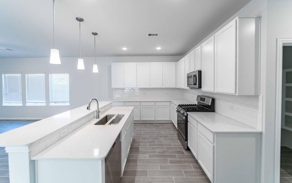 Furnished interior view inside a new home in Caney Mills, Conroe (Image 6).