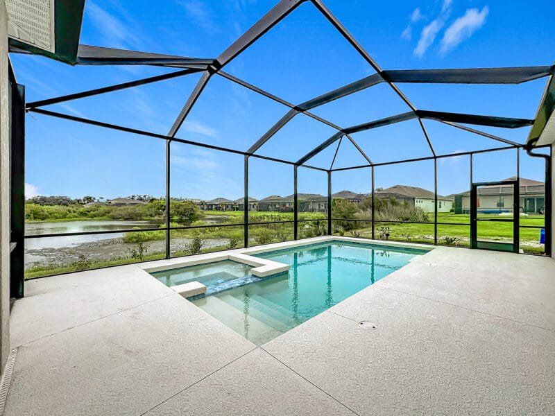 Exterior details and patio area of a home in River Preserve Estates, Parrish (Image 25).