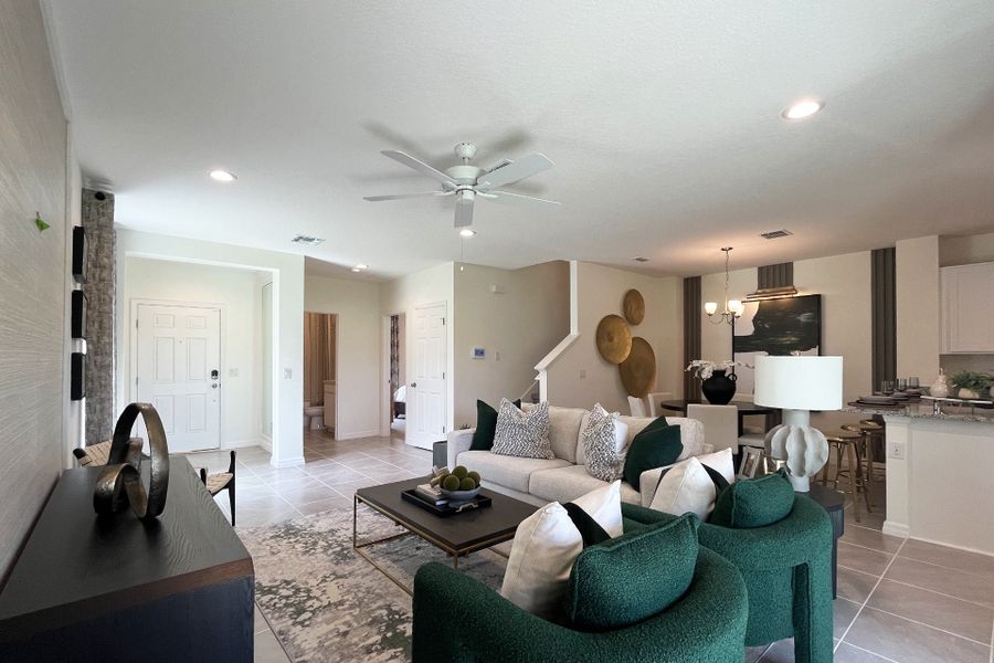 Ashley townhome model in Pine Meadows, Eustis FL — elegant two-story home with 4 bedrooms, 3 baths, and 1,898 sq. ft. of living space. Featuring an open-concept kitchen, dining, and living area, this modern townhome offers flexible layouts for families, guests, or a home office. Highlights include a spacious primary suite with private bath, second-floor laundry, covered lanai, and welcoming entry porch. Built with energy efficiency and stylish design, the Ashley townhome blends comfort, functionality, and charm in a sought-after Central Florida community.