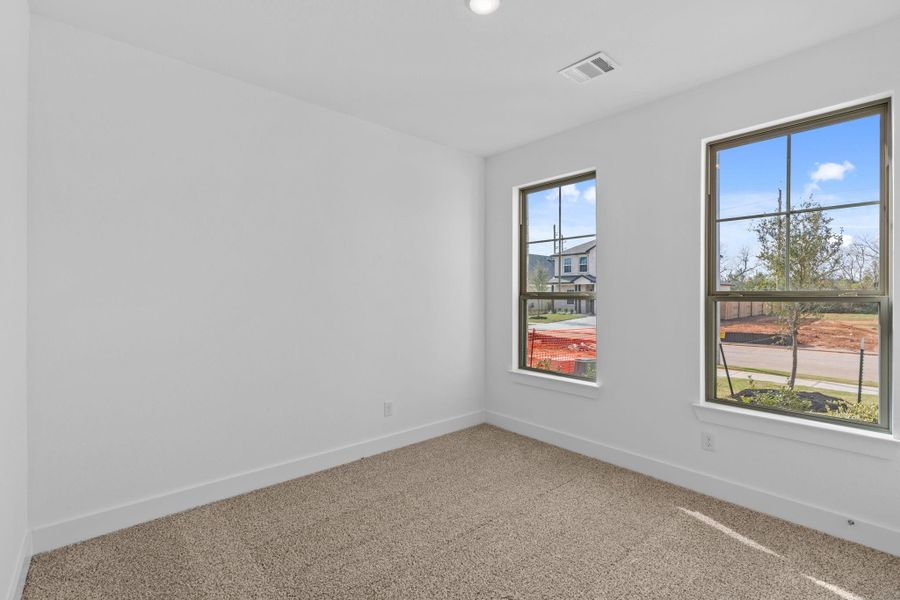 In this home, the secondary bedrooms are not just additional spaces; they’re integral parts of a lifestyle where comfort and style blend seamlessly. It’s where memories will be made, dreams will be nurtured, and everyone will feel right at home.