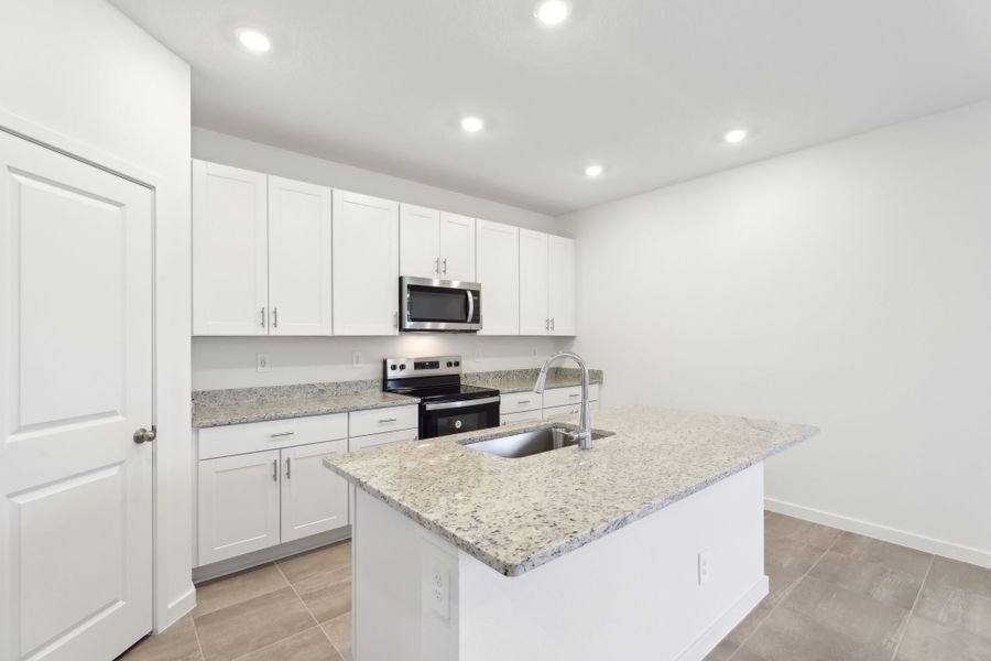 Furnished interior view inside a new home in Lakes at Bella Lago - Signature Series, Green Cove Springs (Image 5).