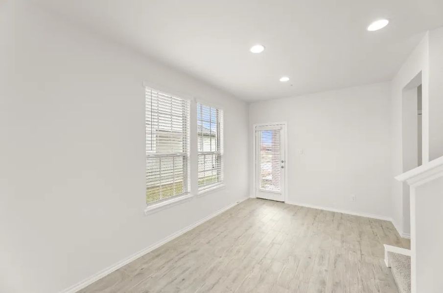 Front exterior of a new home in Sanger Circle, Sanger, TX, highlighting curb appeal (Image 5).