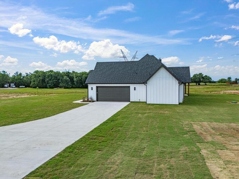 Front exterior of a new home in , Alvord, TX, highlighting curb appeal (Image 25).