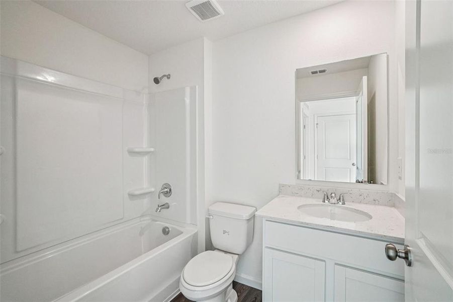 Furnished interior view inside a new home in Sumter Villas, Sumterville (Image 11).