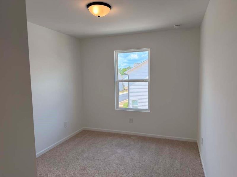 Spacious, unfurnished interior of a new home in Laurelwood, Douglasville (Image 21).