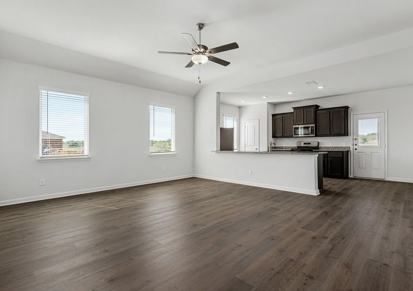 This open-concept layout connects the kitchen, dining room and family room. This open-concept layout connects the kitchen, dining room and family room.