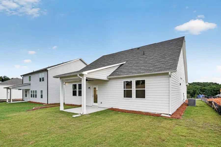 Exterior details and patio area of a home in Weatherfield, Buford (Image 22).