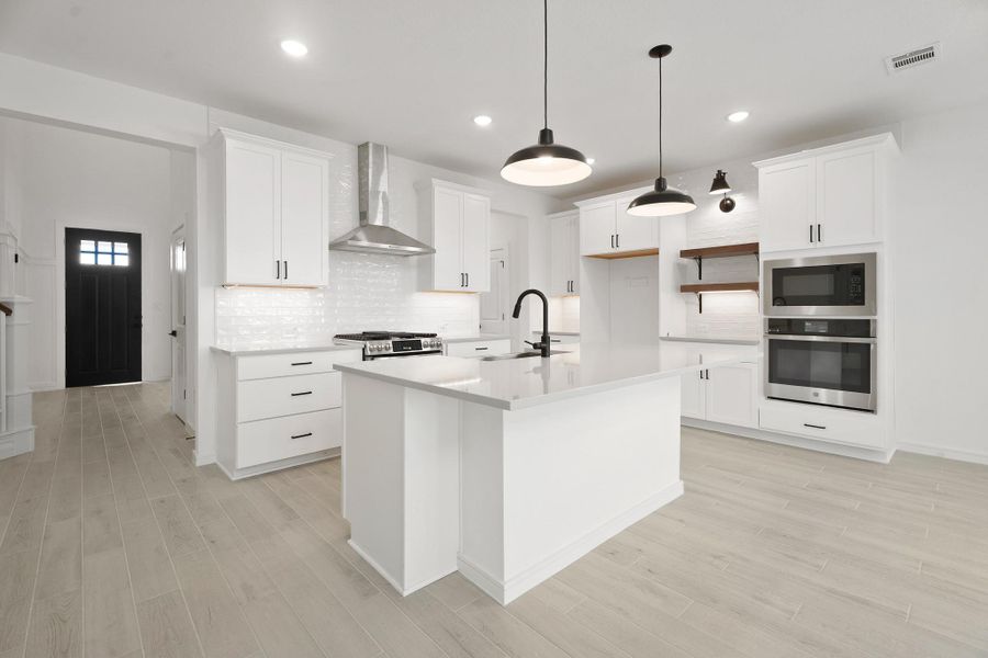 Gourmet island kitchen (*Photo not of actual home and used for illustration purposes only.) Gourmet island kitchen (*Photo not of actual home and used for illustration purposes only.)