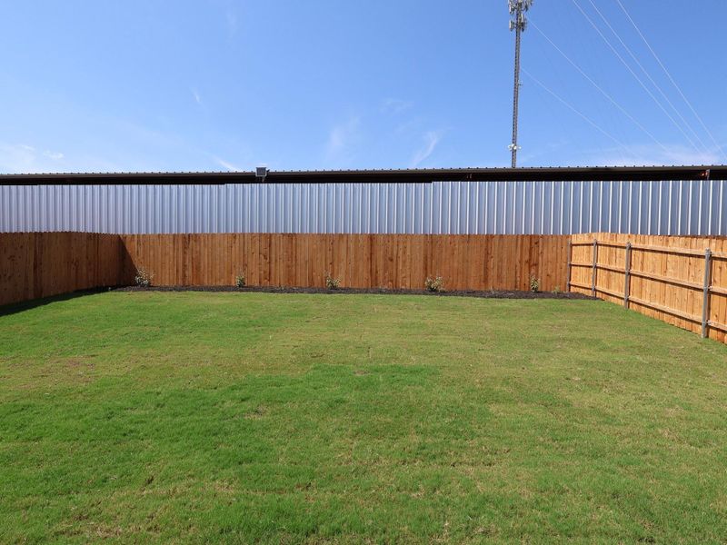 Exterior details and patio area of a home in Edgewood, Leander (Image 4).