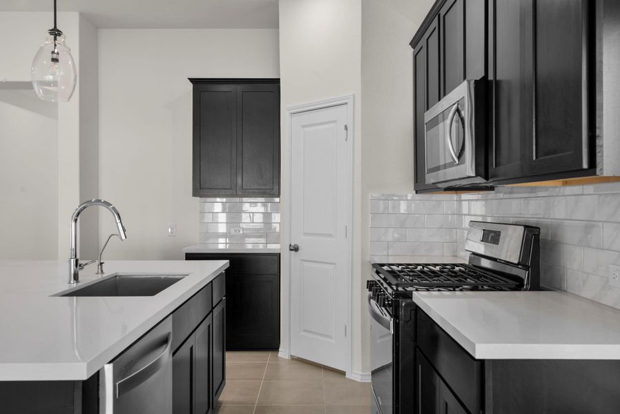 Furnished interior view inside a new home in Grand Central Park, Conroe (Image 8).