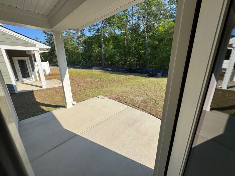 Exterior details and patio area of a home in , Ravenel (Image 20).