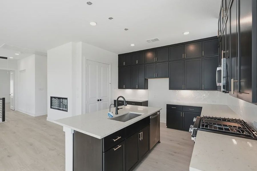 Representative furnished interior of a home built from the Athena by Chesmar Homes in Prominence Urban, San Antonio (Image 9).