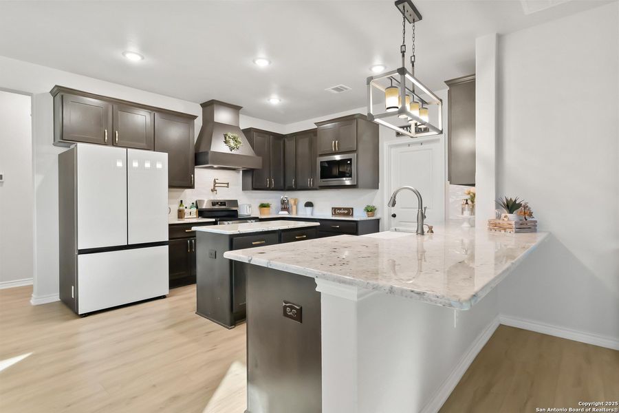 Furnished interior view inside a new home in , Devine (Image 32). Furnished interior view inside a new home in , Devine (Image 32).