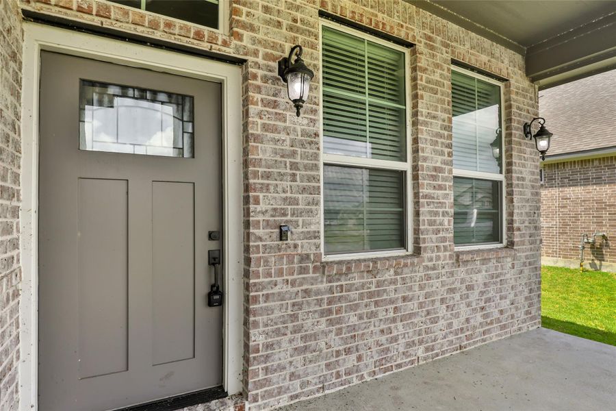 Exterior details and patio area of a home in , Anahuac (Image 28).