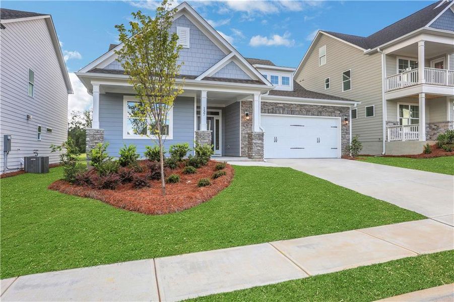 Front exterior of a new home in Twin Lakes, Hoschton, GA, highlighting curb appeal (Image 26).