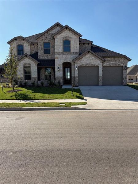Front exterior of a new home in Callan Village, Lorena, TX, highlighting curb appeal (Image 2). Front exterior of a new home in Callan Village, Lorena, TX, highlighting curb appeal (Image 2).