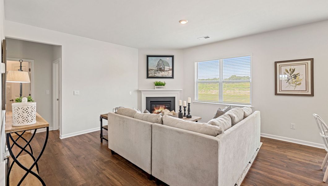 Representative furnished interior of a home built from the HAYDEN by D.R. Horton in Harrier Point, Woodruff (Image 15).