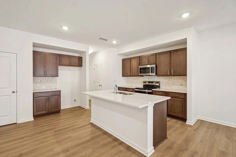 Sample Photo: Kitchen featuring Roosevelt Collection Finishes Sample Photo: Kitchen featuring Roosevelt Collection Finishes