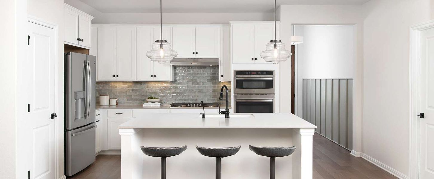 Representative furnished interior of a home built from the Medina II by Ashton Woods in The Colony 50s, Bastrop (Image 4).