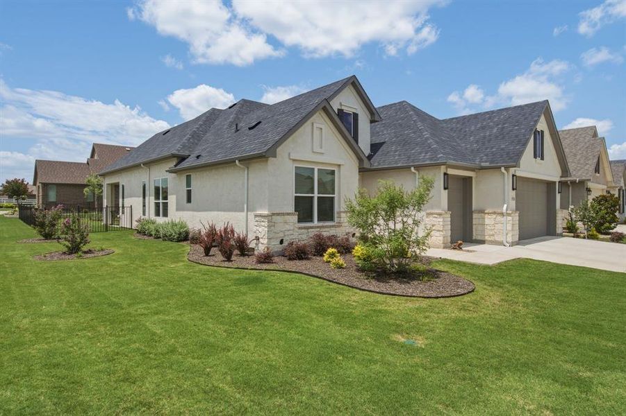 Front exterior of a new home in , Denton, TX, highlighting curb appeal (Image 21).