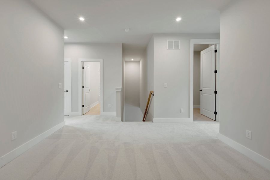 Spacious, unfurnished interior of a new home in Seven Oaks, Belmont (Image 21).
