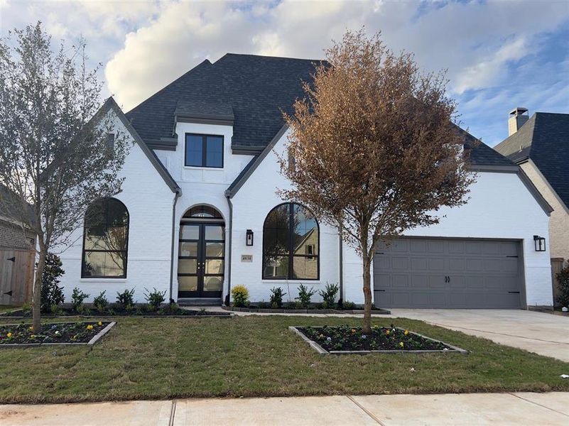 Eye catching painted brick give this home major curb appeal