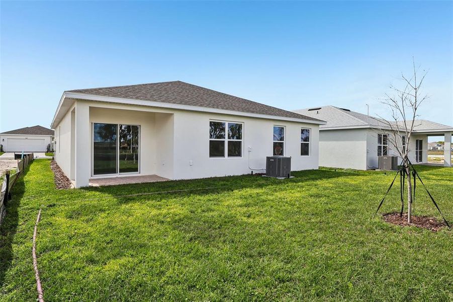 Exterior details and patio area of a home in Willowbrook North, Winter Haven (Image 18).