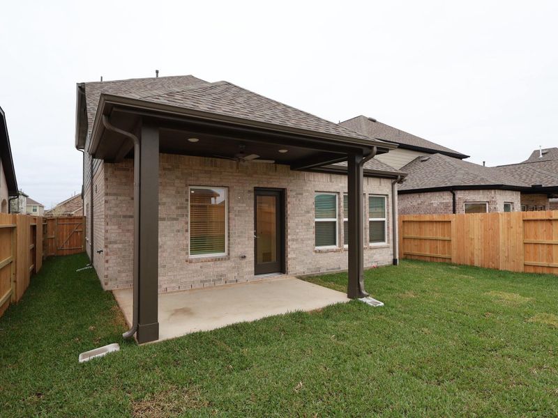 Exterior details and patio area of a home in Marvida, Cypress (Image 15). Exterior details and patio area of a home in Marvida, Cypress (Image 15).