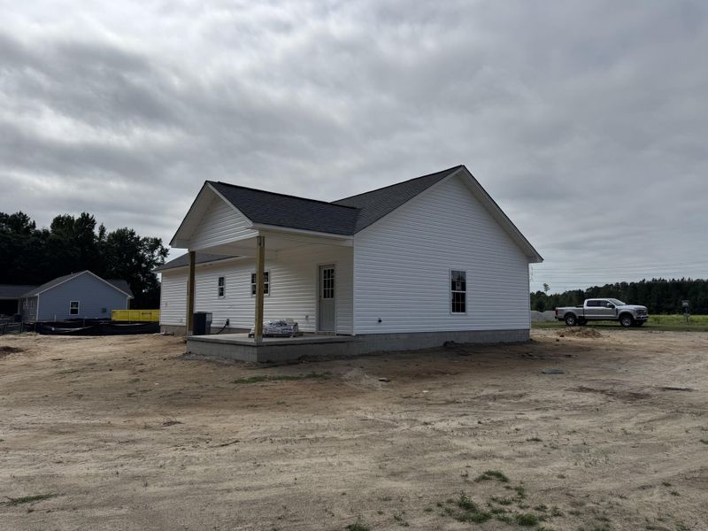 Front exterior of a new home in , St. George, SC, highlighting curb appeal (Image 2). Front exterior of a new home in , St. George, SC, highlighting curb appeal (Image 2).