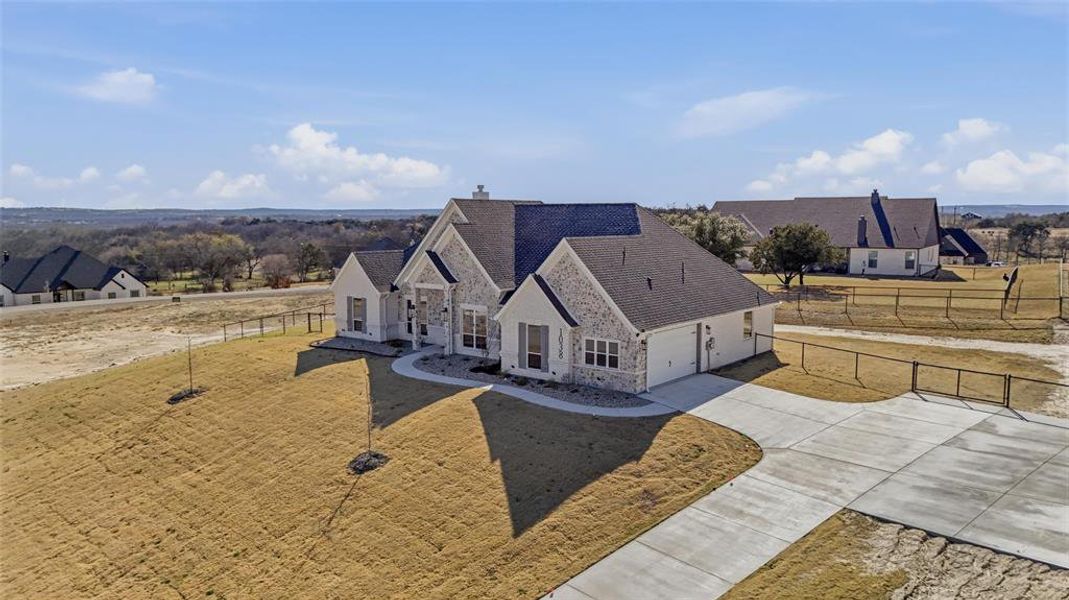 Front exterior of a new home in , Azle, TX, highlighting curb appeal (Image 16).