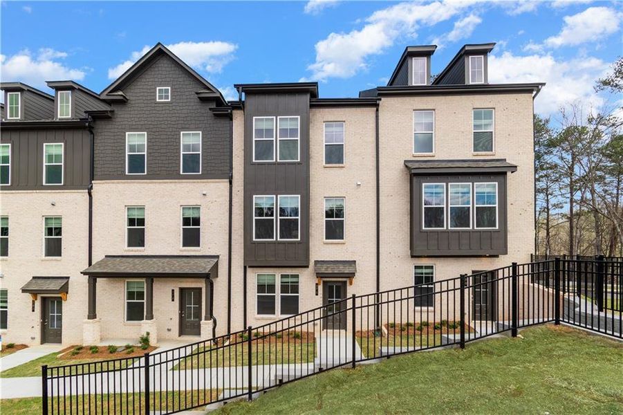 Front exterior of a new home in Daybreak, Newnan, GA, highlighting curb appeal (Image 14).
