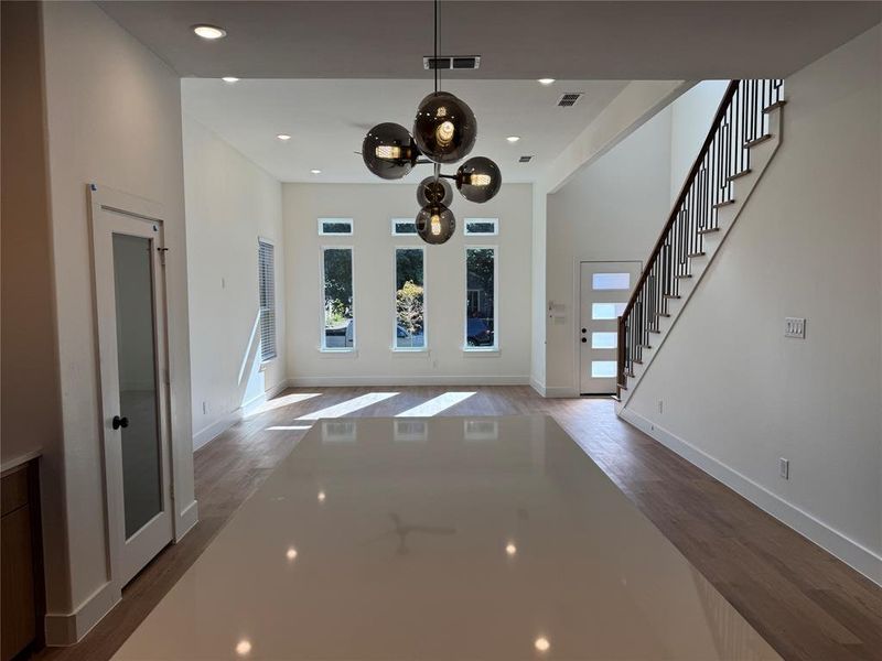 Unfurnished living room with wood-type flooring