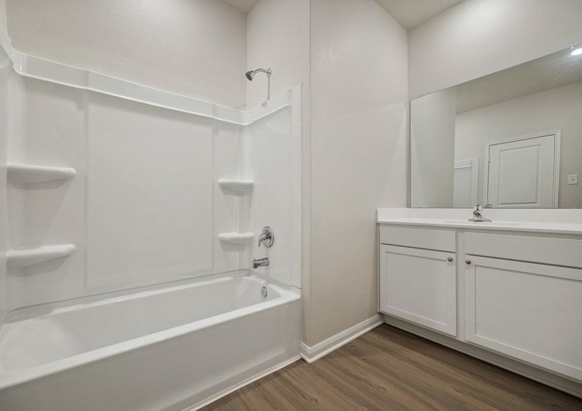 Secondary bathroom with a tub/shower combination Secondary bathroom with a tub/shower combination