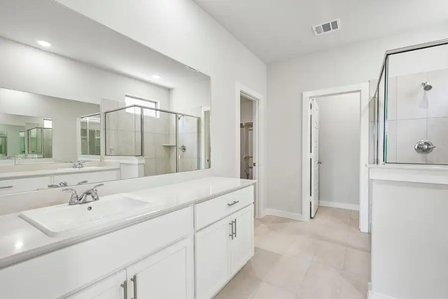 Primary Bathroom in the Wimbledon home plan by Trophy Signature Homes