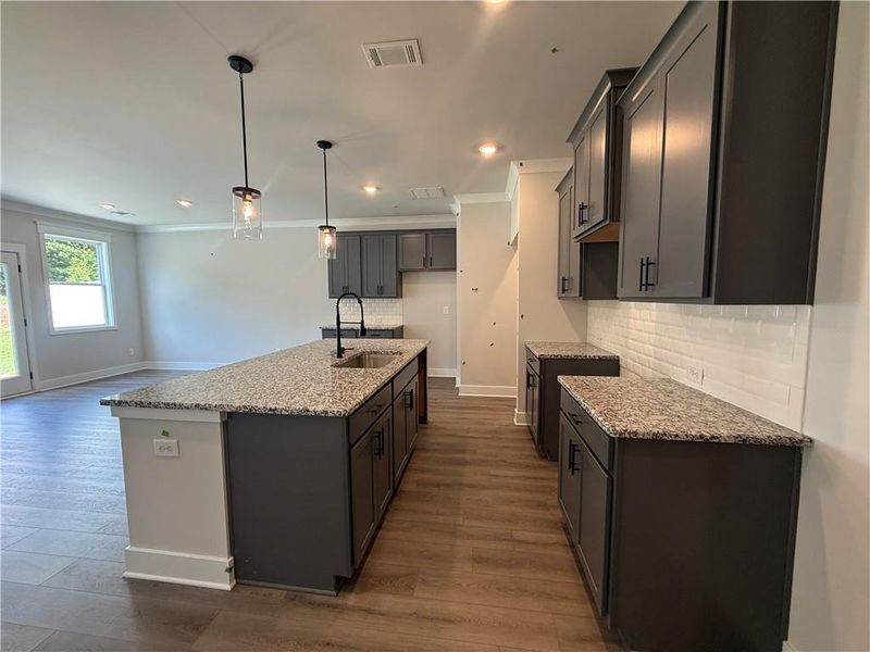 Furnished interior view inside a new home in The Towns at Auburn Station East, Auburn (Image 4).