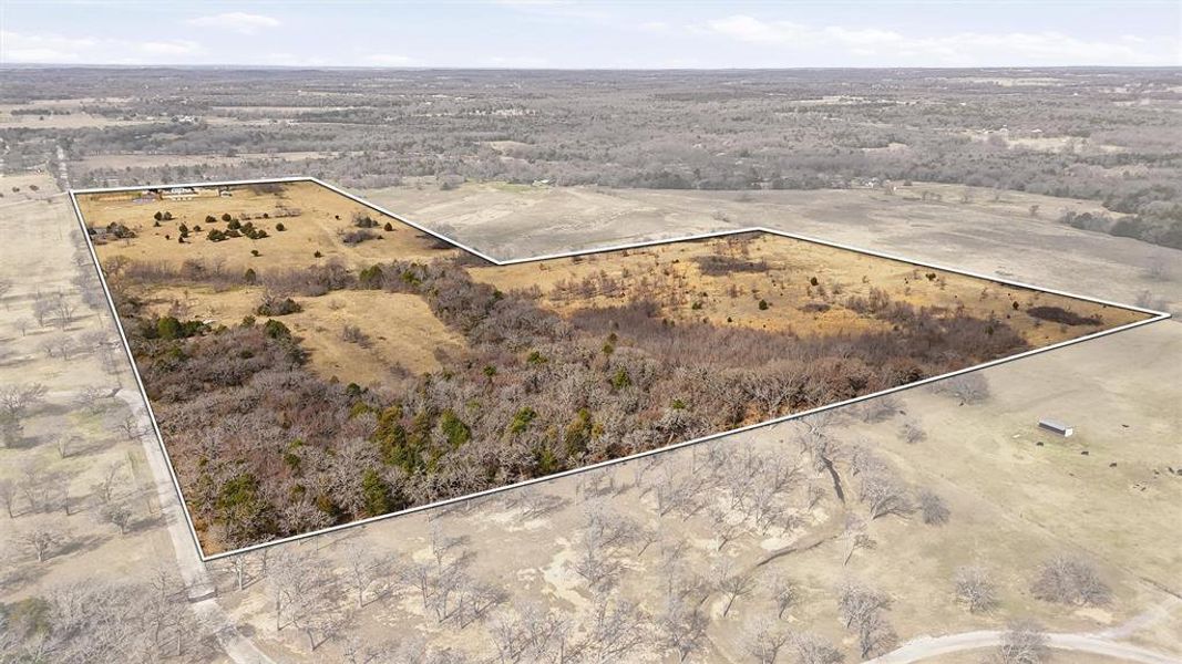 Aerial view from the back of the property looking towards County Road 297.